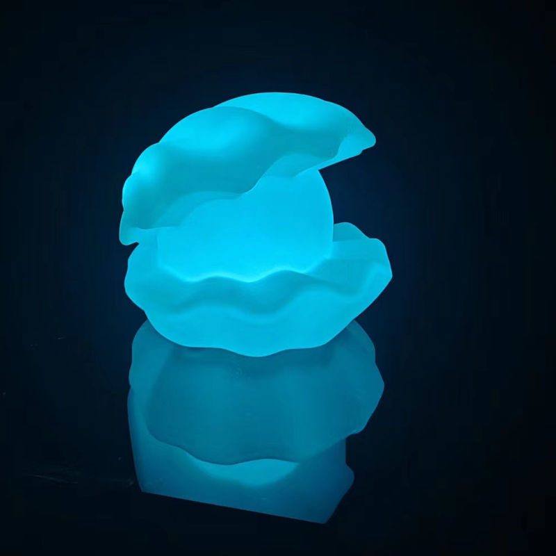 Des lumières colorées de la piscine, des lumières LED en RGB, des lumières de nuit pour enfants, forme de coquille